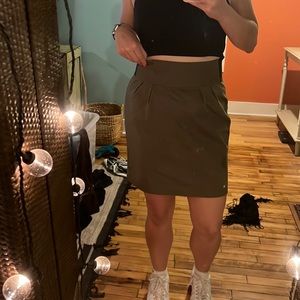 Forest green very flattering pencil skirt. Very nice quality but well loved